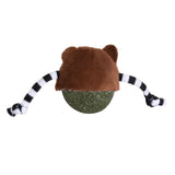 The Quirky Kitty Bobble Bear Catnip Bobbler is a green ball with a fuzzy brown bear ear hat and two black and white striped strings resembling arms, perfect for feline fun.