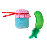 The Quirky Kitty Pickled Mewcumbers Catnip Plush Cat Toy features a charming blue jar plush with a pink and white checkered lid, tied with a red ribbon. The green pickle-shaped plush is infused with catnip, crinkle paper, silvervine, and topped with a playful feather to entertain any curious cat.