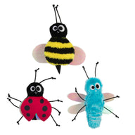 The Mad Cat Buggin Out Bulk Bin includes three plush insect toys infused with Silvernip®: a striped yellow-and-black bee, a red ladybug with black spots and antennae, and a fuzzy blue fly with translucent wings. All have smiling faces and cartoonish eyes that attract your feline friends.