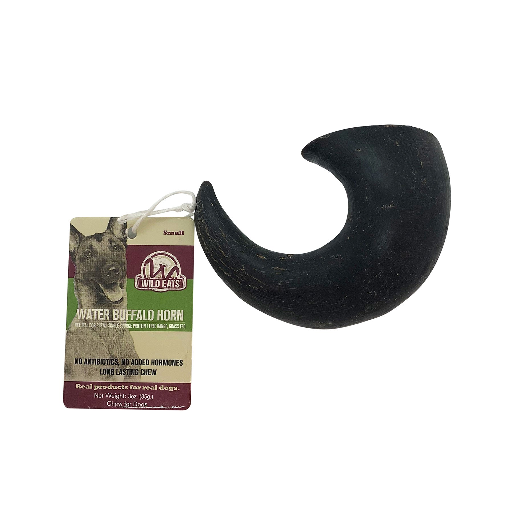 A black, curved water buffalo horn dog chew from Wild Eats is secured to a tag with a dog image, labeled Wild Eats Water Buffalo Horn. This natural, grain-free treat ensures a balanced diet for dogs, with no added antibiotics or hormones.