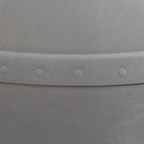 Close-up of the Petmate Husky Dog House by Petmate, showcasing a metallic surface with a lightly brushed texture and a curved seam accented by evenly spaced rivets for an industrial look.