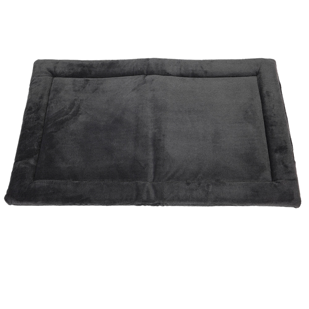 The Petmate Kennel Mat by Petmate is a rectangular, dark grey pet bed with a soft velvety texture and non-skid bottom, featuring a raised border and plush flat center like a mattress, ensuring it offers comfort for small to medium-sized pets while staying in place.