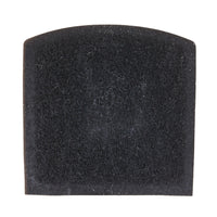 A close-up of a black porous foam sponge, similar to the Petmate Zeolite Filter For Jumbo Hooded Litter Pans, shows tiny holes ideal for odor absorption. Its slightly curved top edge stands out against the plain white background, highlighting its Zeolite Charcoal-like texture.