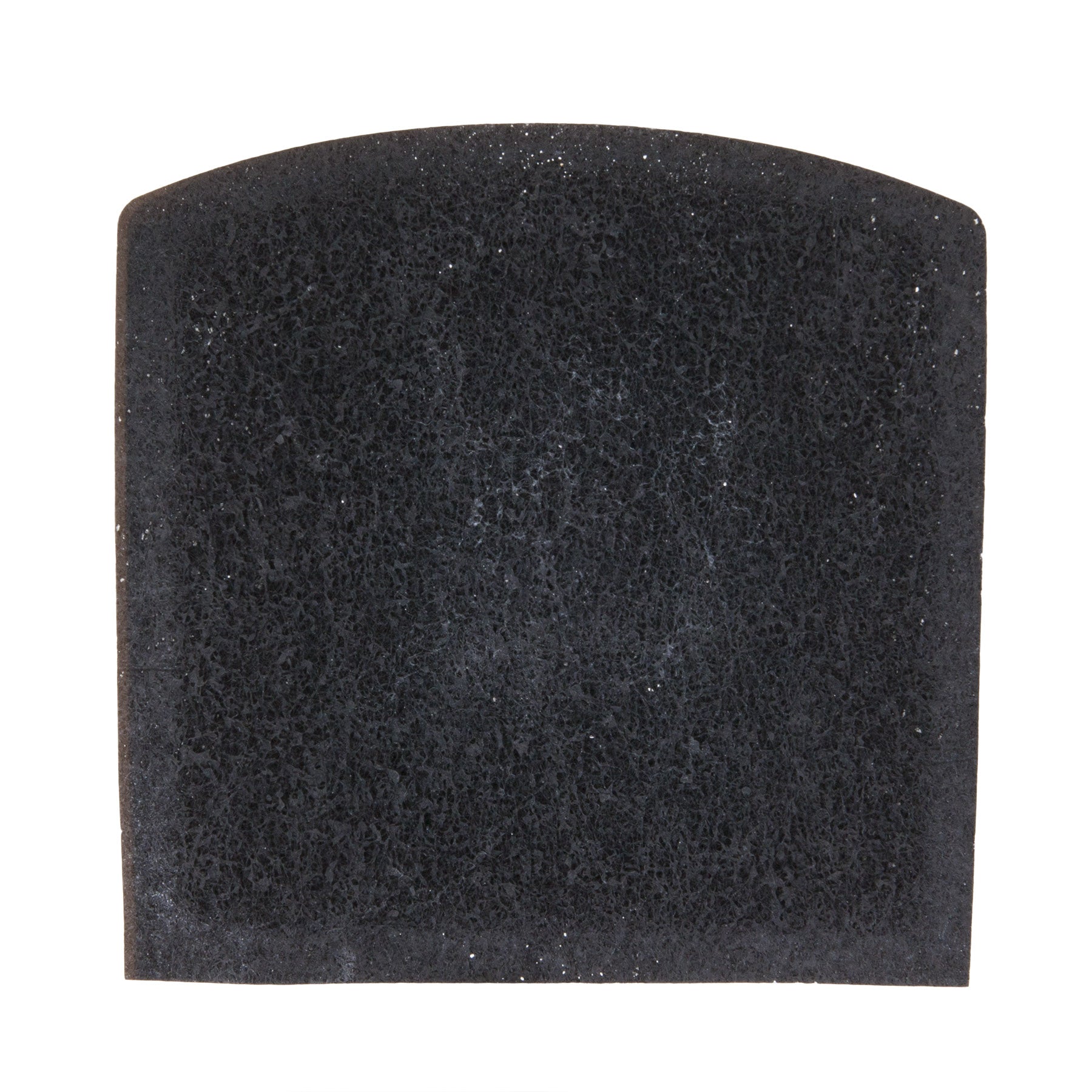 A close-up of a black porous foam sponge, similar to the Petmate Zeolite Filter For Jumbo Hooded Litter Pans, shows tiny holes ideal for odor absorption. Its slightly curved top edge stands out against the plain white background, highlighting its Zeolite Charcoal-like texture.