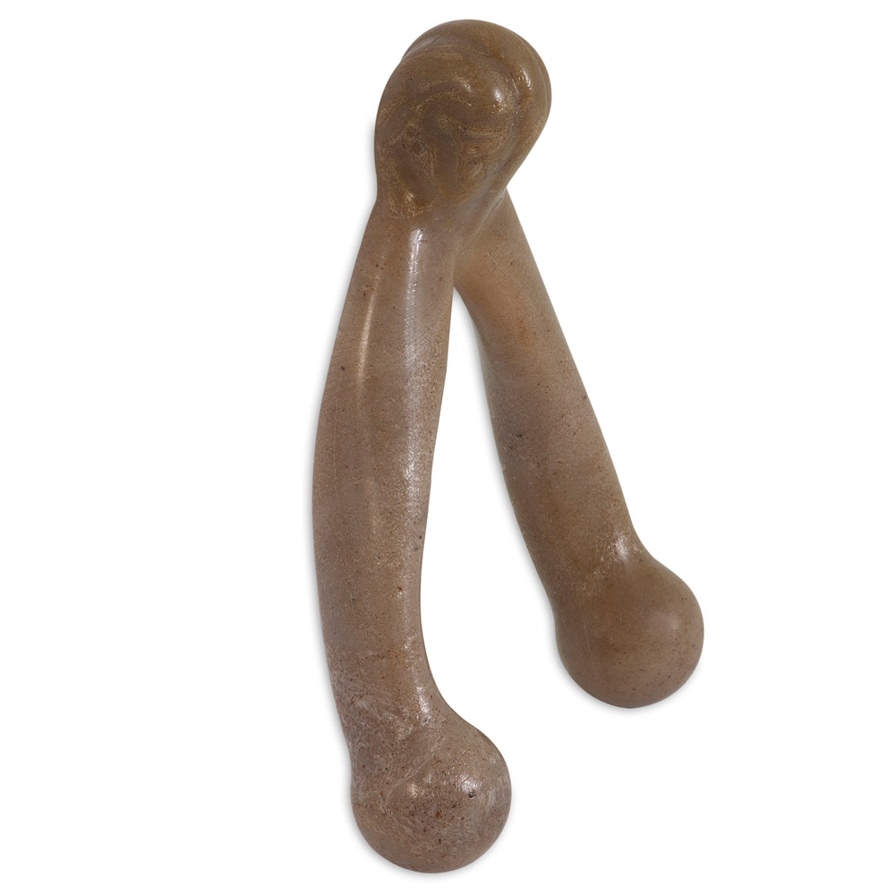 The BarkBone Natural Instincts Wishbone Bacon-Infused Nylon Dog Chew by Barkbone Natural Instincts is like finding a smooth, glossy, brown Y-shaped stone figure with rounded ends, resembling an ancient artifact.