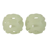 Two identical, spherical, light green Chuckit! Max Glow Air Fetch Ball toys feature an open lattice design and semi-transparent material, with the Chuckit logo embossed for style.