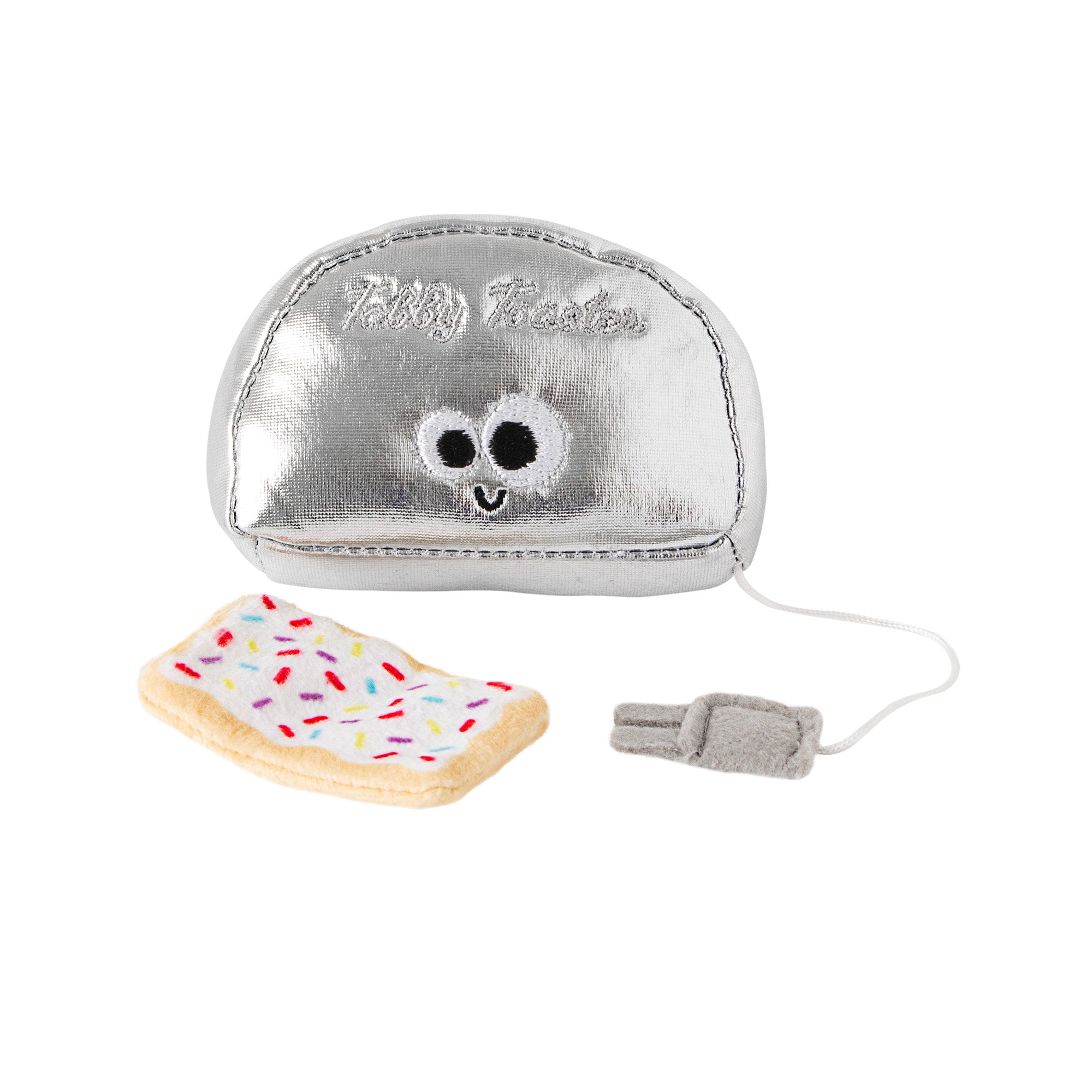The Mad Cat Buzzing For Breakfast Cat Toy from Mad Cat features a plush silver toaster with embroidered eyes and a smiling mouth, holding a fabric pastry toy with sprinkles. Its designed to engage your cats natural hunting instincts, featuring an attached playful grey cord.
