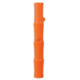 The JW Bamboo Stick from Jw is an orange rubber dog toy shaped like a bamboo stick with segmented sections and a small knob resembling a branch, shown standing upright on a plain white background.