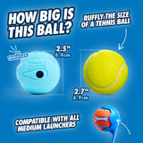The blue Chuckit! The Whistler Dog Toy, measuring 2.5 inches (6.4 cm), whistles when thrown and pairs perfectly with a 2.7-inch (6.9 cm) tennis ball for fetch. Both high-bouncing rubber balls fit all medium launchers, promising endless fun!.