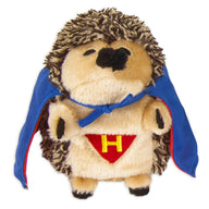 The Zoobilee Super Hero Heggie Dog Toy by Zoobilee features a plush hedgehog dressed as a superhero, complete with a blue cape and red outfit with a yellow H. Its fluffy gray-beige fur, small black eyes, and nose make it ideal for endless hugs.