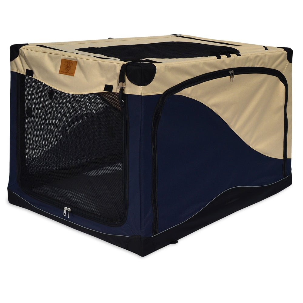 The Precision Pet Soft Sided Pet Crate by Precision Pet Products is a collapsible, portable pet crate with beige and dark blue fabric, black mesh ventilation, and zippered top and front openings. It features a small brown leather patch on the front panel.