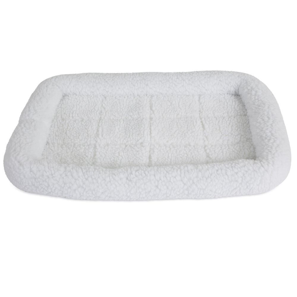 The SnooZZy Faux Sheepskin Bolster Kennel Mat by Snoozzy is a rectangular white fleece pet bed with a cushioned border, perfect for crate training. Its ideal for small pets, featuring a soft, textured surface and is machine washable for easy care.