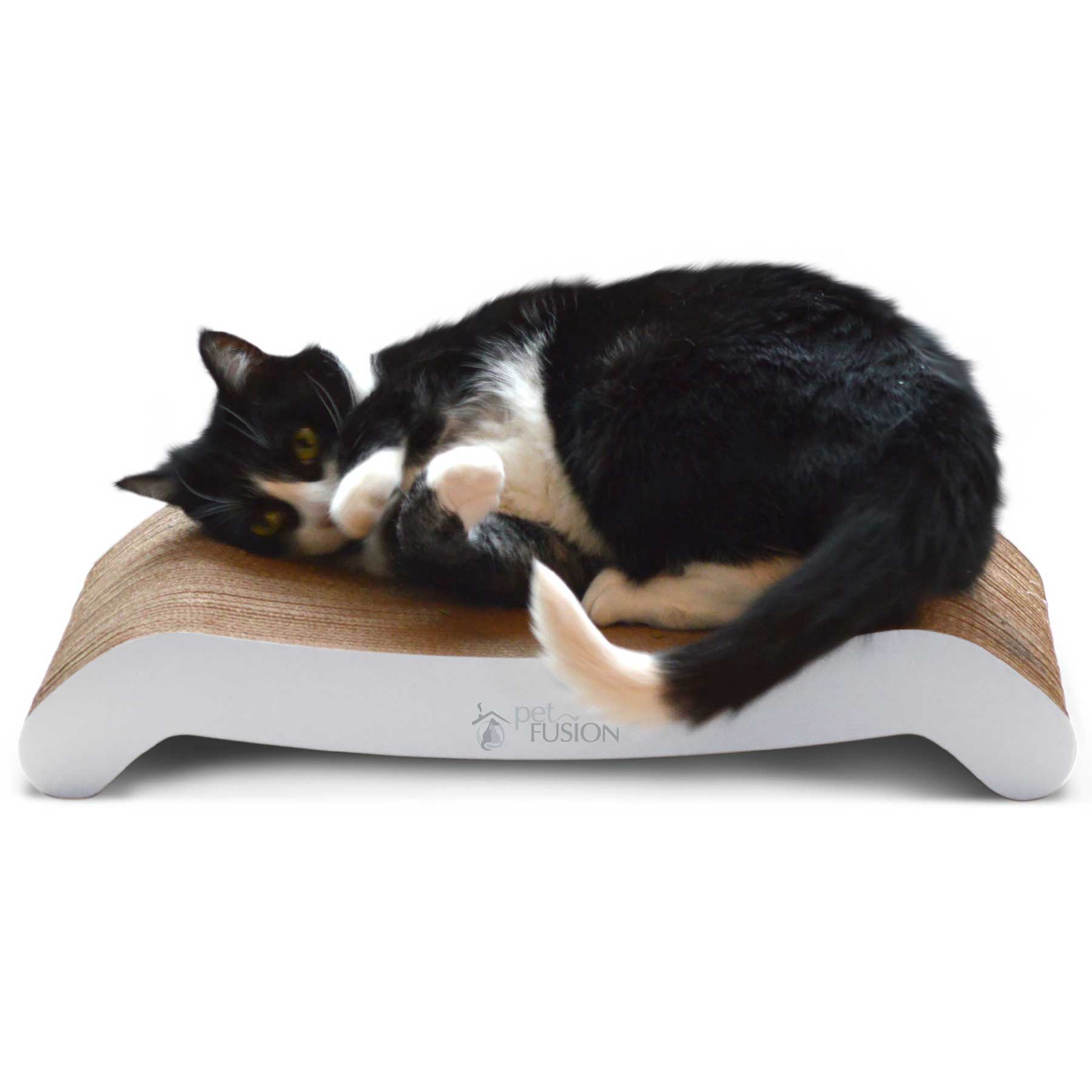 A black and white cat lounges comfortably on the PetFusion Cat Scratching Flip Pad. This premium, curved brown cardboard pad with white sides and Pet Fusion embossed allows the cat to curl playfully.