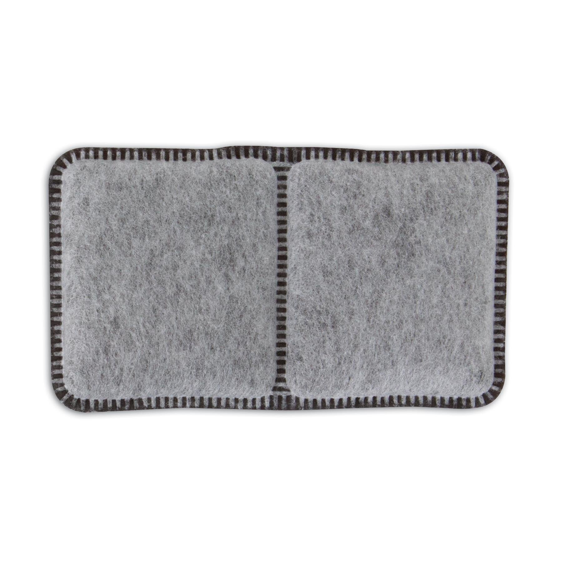The Aspen Pet product resembles a rectangular gray felt coaster with black stitching, divided into two square sections, reminiscent of charcoal filters.
