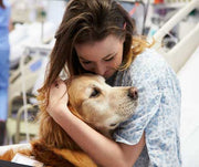 Woman hugging her dog