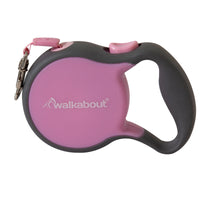 The Petmate Walkabout Retractable Leash features a pink design, black handle, and pink buttons. It includes a quick action brake release, tangle-free inlets, Petmate printed on the body, and a metal clasp for secure collar attachment.