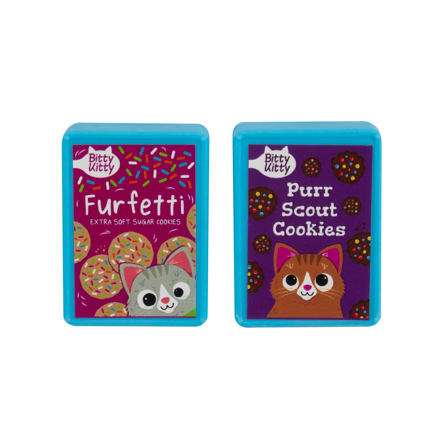 Two vibrant Mad Cat Purr Scout Cookies Batty Boxes impress with charm: one labeled Furfetti Extra Soft Sugar Cookies featuring a cat, the other Purr Scout Cookies with a kitten illustration. Ideal for playful Mad Cat® moments!.