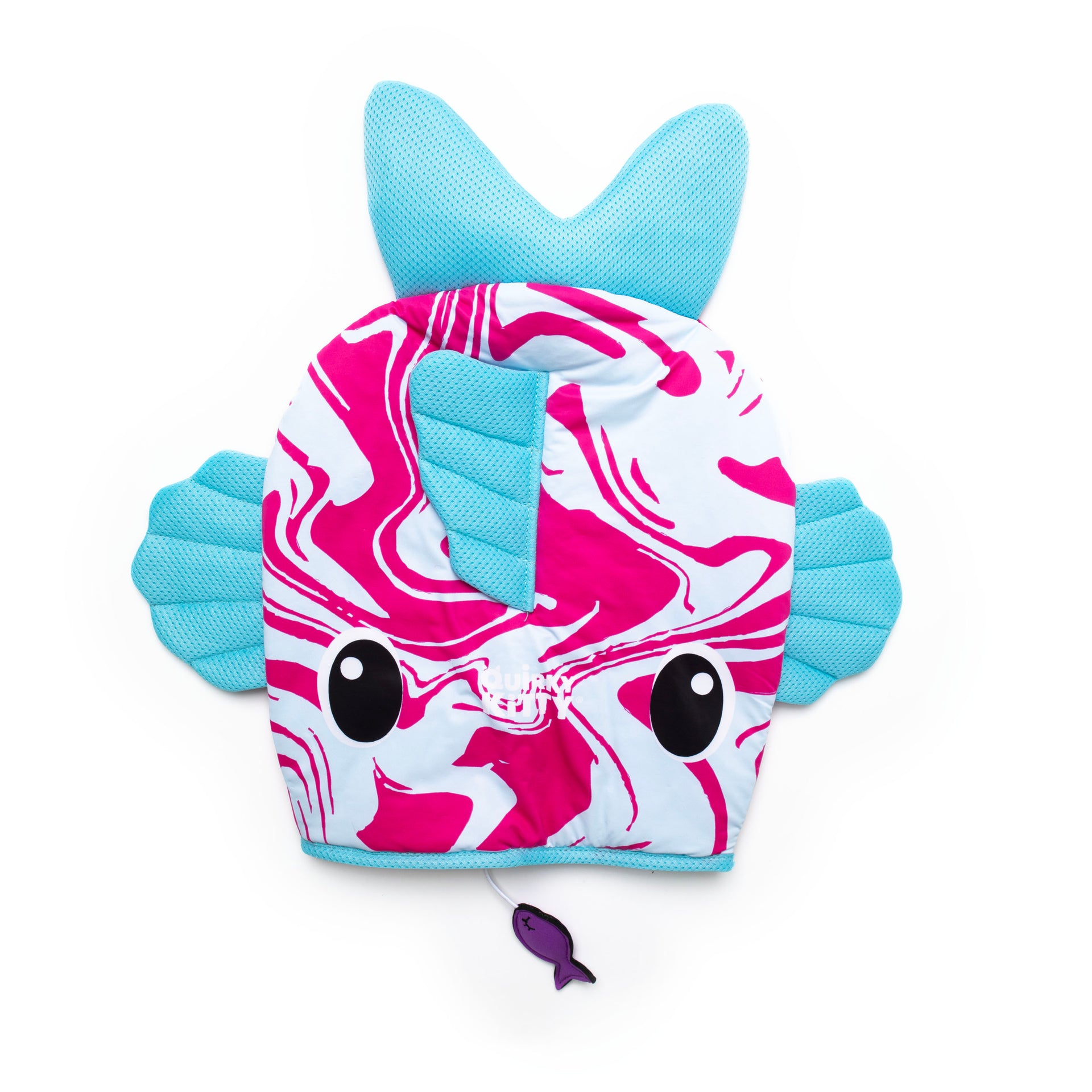 The Quirky Kitty® Ocean Cool Mat by Quirky Kitty features a fish shape with blue fins and tail, a pink and white swirled body, large black eyes, and a small purple fish detail, all set against a white background.