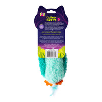 A fuzzy blue and teal Quirky Kitty Night Owl Kicker cat toy with orange feet and a feather tail, glows in the dark, contains catnip and silvervine, and is attached to purple Quirky Kitty packaging with product details and barcode on back.