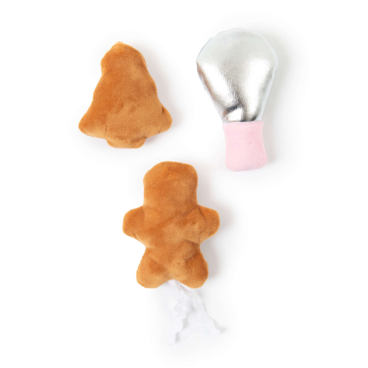 Quirky Kitty® Baking Spirits Bright 3-Pack cat toys featuring a tan gingerbread man, a tan Christmas tree, and a silver and pink chicken leg.