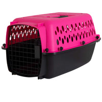 The Aspen Petmate Pet Porter in pink and black includes a grated metal door and quick-latching system for easy access. With multiple ventilation holes, it meets airline requirements for transporting small pets safely and comfortably.