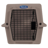 The image shows a beige Petmate Ultra Vari Kennel with a black wire door featuring the brand logo above the latch for secure closure.