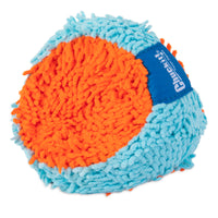 The Chuckit! Indoor Fetch Tumbler Toy for Dogs, by Chuckit, features a textured ball with fuzzy blue and orange patches and a small blue tag. Its surface has protruding fibers, making it soft and tactile, ideal for indoor fetch sessions with the Chuckit! Indoor Launcher.