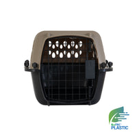 A brown and black Petmate Vari Kennel features a grid door, ventilation holes, a top handle, and an EcoTEC Plastic logo to emphasize eco-friendly materials, making it perfect for stylishly securing or housebreaking your pet.