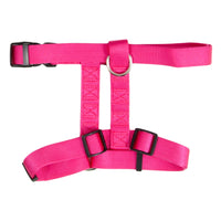 Try Petmate Adjustable Dog Harness in pink, made with fray-resistant nylon and adjustable straps. Featuring black buckles and a strong metal D-ring for leash attachment, it ensures comfort by evenly distributing pressure across your pets body.