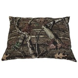 The Ruffmaxx Mossy Oak Pillow Dog Bed by Ruff Maxx features a realistic forest floor camo pattern with branches, leaves, and bark in brown and green hues. Its ideal as an outdoor dog bed cushion or water-resistant dog bed topper.