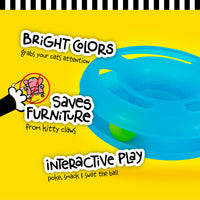 The FAT CAT Crazy Circle Cat Toy by Fatcat, featuring a blue circular design with a green ball inside, is set against a yellow background. It highlights its bright colors and promotes interactive play for cats by poking, smacking, and swatting the ball to help protect furniture from claws.