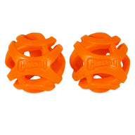 Two Chuckit! Air Fetch Balls, featuring a geometric lattice design and durable orange rubber with Chuckit! embossed on each, are arranged side by side against a plain white background.