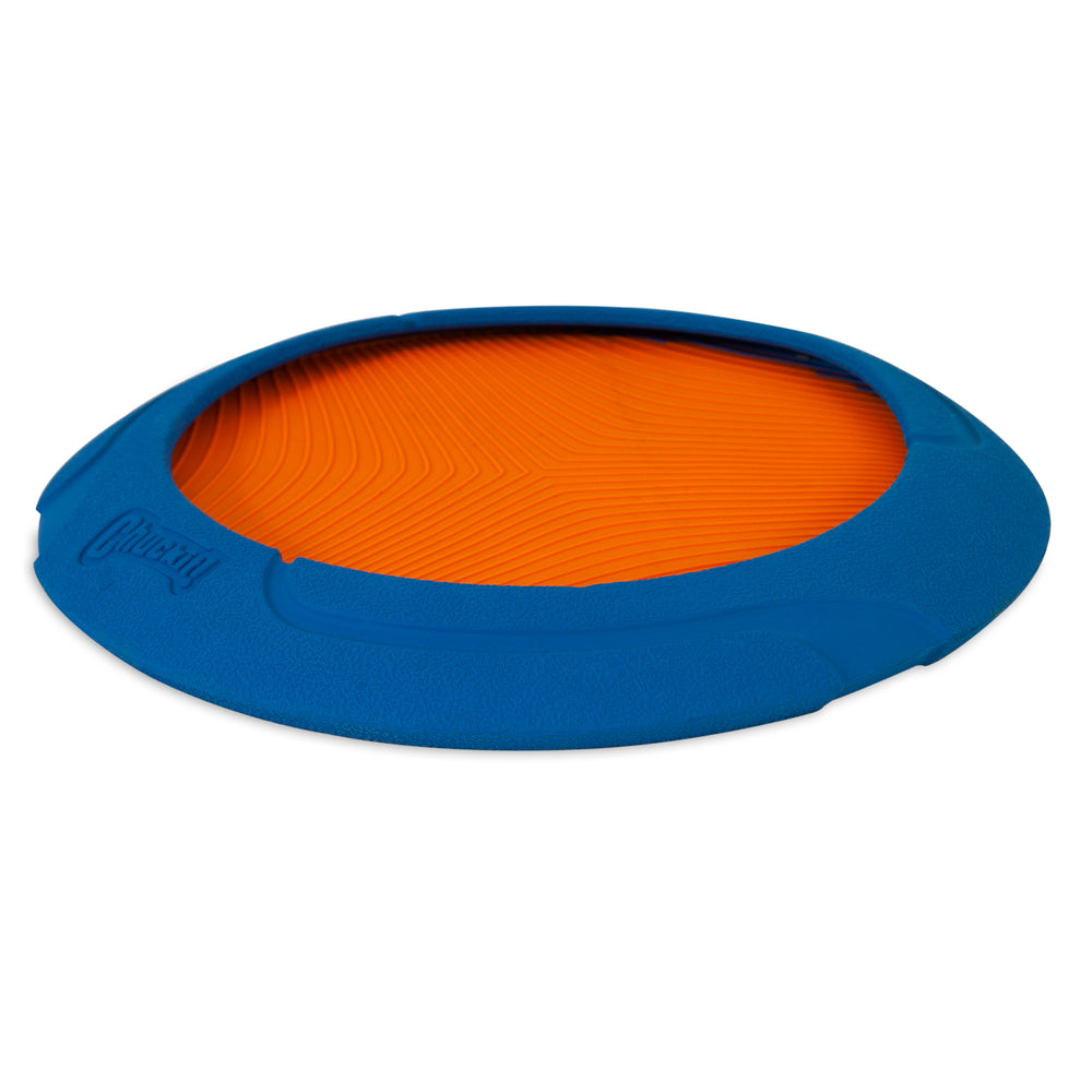 The Chuckit! Ultra Flight fetch toy for dogs features a blue and orange rubber frisbee with a durable edge. Its textured surface and raised rim display the Chuckit brand name, all set against a pristine white background.