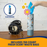 An Arm & Hammer Gotta Go Waste Bag Dispenser with a floral pattern is shown as a hand pulls out a blue waste bag. Nearby, a wire basket contains a dog leash and collar. Text reads: Includes 150-count fresh-scent waste bags from Arm And Hammer for effective odor control.