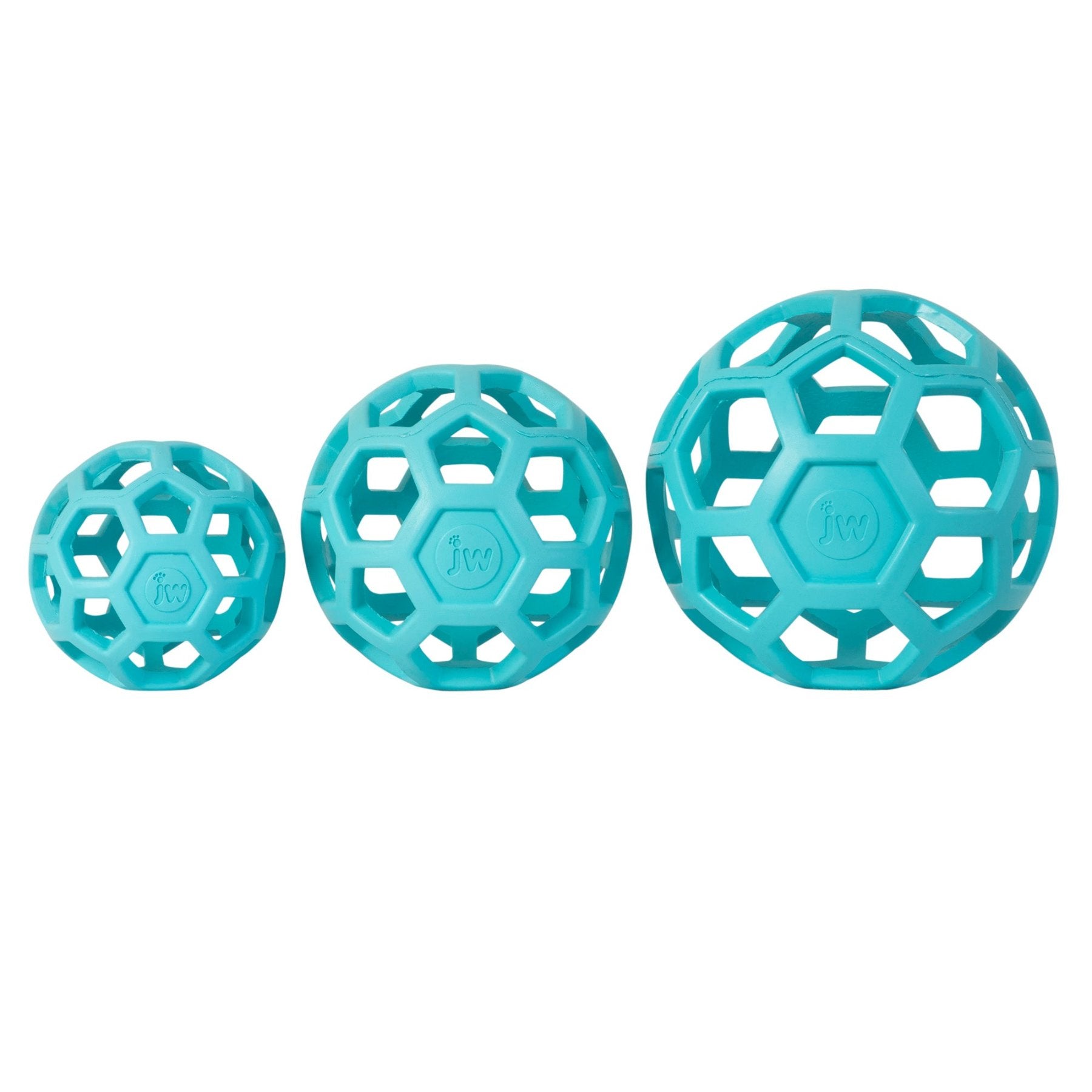 Three turquoise JW Hol-EE Roller Trend-EE Puzzle Balls of increasing size are aligned in a row, crafted from natural rubber with hexagonal cutouts and an embossed JW logo. The plain white background highlights them as tools for mental stimulation.