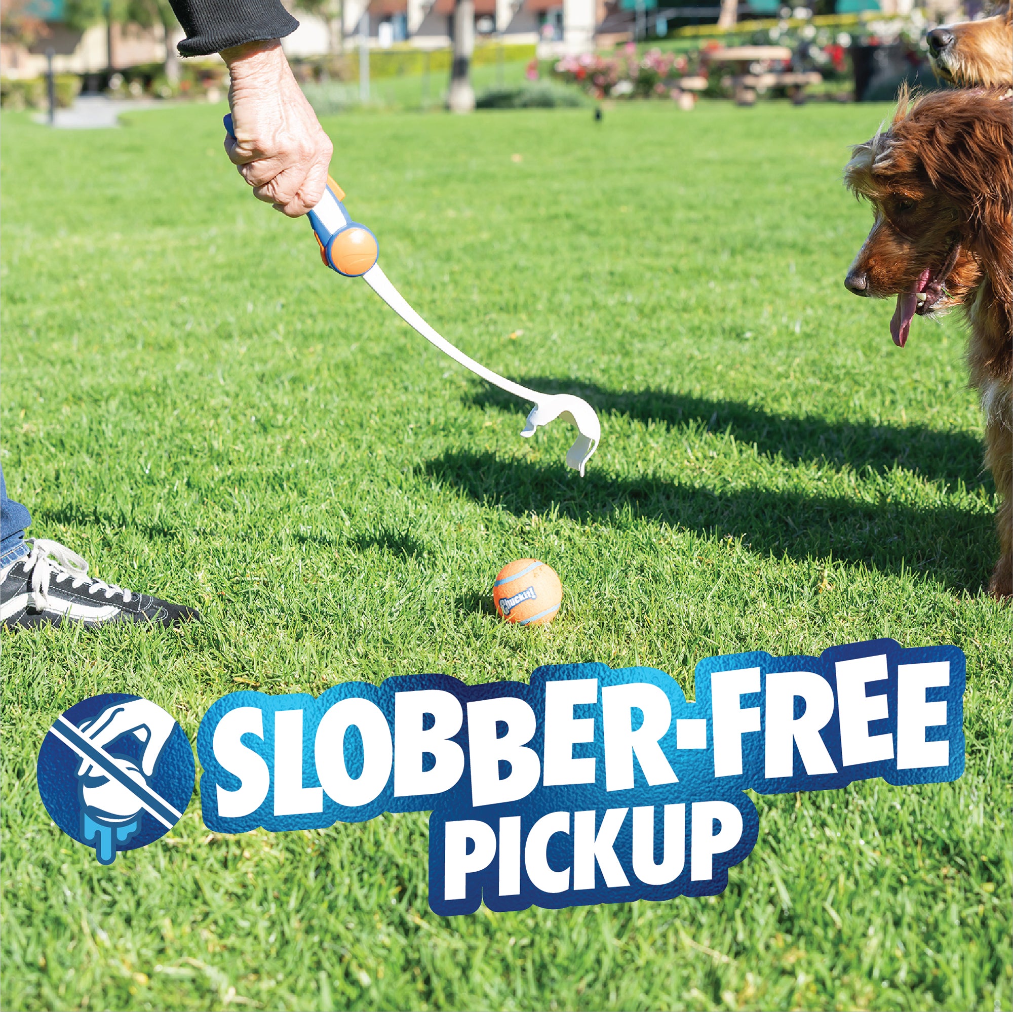 Using the Chuckit! Ultra Ball Launcher 18" Medium with included tennis ball, a person picks up a ball from the grass as a brown dog looks on. Text reads "Slobber-Free Pickup" with an icon of a crossed-out slobbering mouth.
