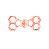 The Chuckit! Hol-ee Bone by Chuckit! is a translucent orange natural rubber dog puzzle toy, bone-shaped with hexagonal holes at each end and "bump" embossed in the center.