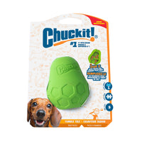 The Chuckit! Tumble Teez Dog Treat Puzzle Toy is a green, turtle shell-shaped treat toy for dogs, packaged on a white and orange card featuring a dachshund image and icons emphasizing fun mental stimulation.