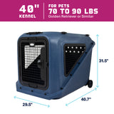 Blue plastic Petmate Basecamp Travel Kennel with a metal wire door and wheels, measuring 40.7 inches long, 29.5 inches wide, and 31.5 inches high, suitable for pets weighing 70 to 90 pounds.