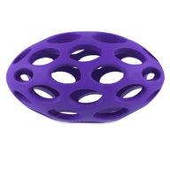 The JW Hol-ee Football Dog Toy by Jw is a durable purple rubber toy featuring multiple large circular holes. Its open structure allows easy grip and flexible play, making it perfect for your pets enjoyment.