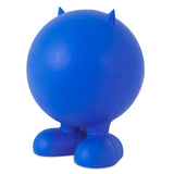 The JW Cuz Dog Toy by Jw is a round, blue cartoonish creature made from natural rubber, featuring small pointed horns on top and large feet at the base. Its a durable and quirky dog toy.