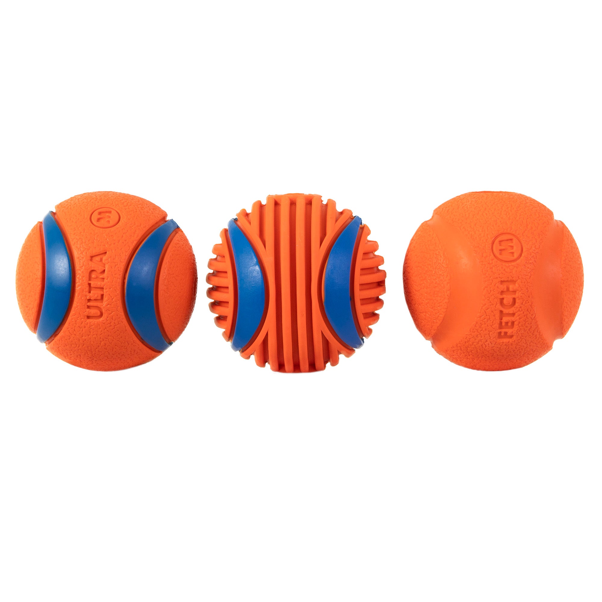 Two Rugged Balls with blue accents are placed on the left and right, while a cylindrical piece from the Chuckit! Fetch Medley Gen 3 with ribbed blue sections is in the center, forming a neat row of three orange dog toys.