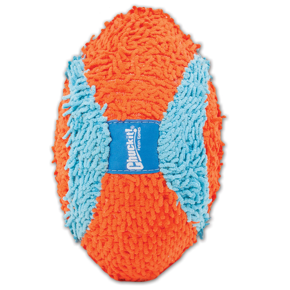 The Chuckit! Indoor Fumbler is an orange textured dog toy with blue X accents, featuring the Chuckit logo on a band, and has a soft, shaggy surface for easy gripping during playful indoor fetch sessions.