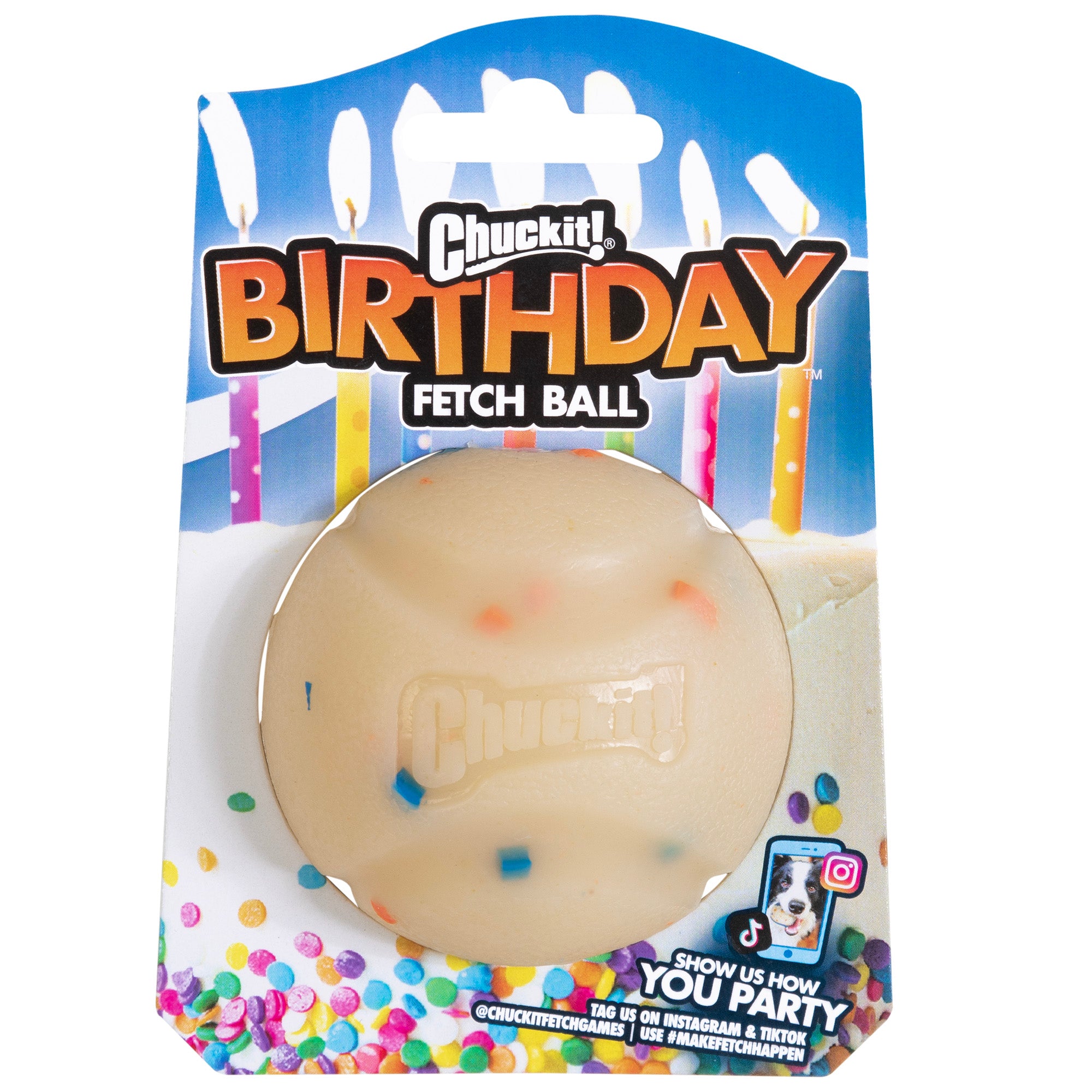 Packaging of Chuckit! Birthday Fetch Ball, featuring a cream natural rubber ball with a confetti design. The background has birthday candles and encourages social media sharing. Compatible with Chuckit launchers for endless fun.