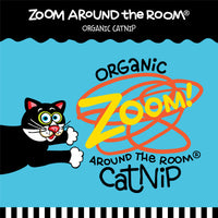 A playful black cat with a white muzzle and paws reaches out beneath the text FAT CAT Classic Fluff Bunnies Cat Toy by Fatcat, with Zoom Around the Room Organic Catnip and a vibrant Zoom! in the center.