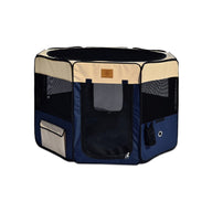 The Precision Pet Soft Side Play Yard by Precision Pet Products is a portable octagonal playpen with beige and navy design, mesh windows, a zippered panel entrance, exterior pockets, and offers a water-resistant safe space among essential pet accessories.