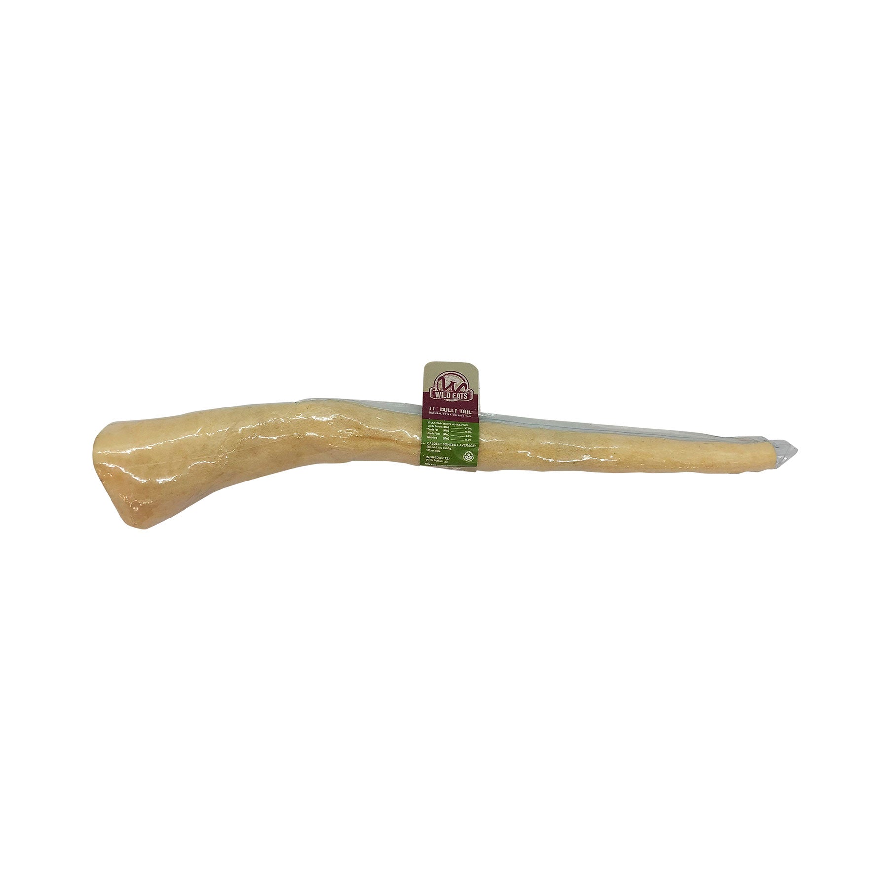 The Wild Eats 11 Water Buffalo Tail Dog Chew by Wild Eats is a large, light beige bone-shaped dog chew wrapped in clear plastic. A small green and beige label near one end highlights its dental health benefits, and it is made from natural water buffalo. The product is set against a white background.