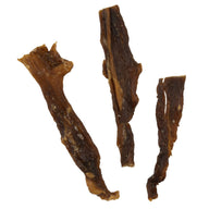 Three pieces of Wild Eats Water Buffalo Jerky, a product by Wild Eats, lie on a white background. The dried strips, in varying sizes and shapes, display the chewy texture typical of jerky.