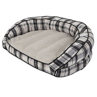 The La-Z-Boy Harper Sofa Dog Bed features a plaid design with raised sides and a black, white, and gray checkered pattern. Filled with Comfort Select fiber-fill for cozy rest, its machine washable and easily complements various home decors.