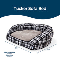 Introducing the La-Z-Boy Tucker Plaid Sofa Dog Bed in classic black and white. Ideal for medium-sized dogs, it includes ComfortSelect fiberfill and raised sides for comfort. Its outer dimensions are 33x30 inches, with a sleep area of 26x25 inches.